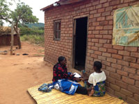 Interviewing a pregnant woman in Mchinji District, Malawi, about her pregnancy