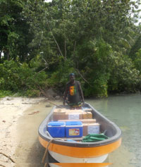 Loading equipment onto our study boat for pre-MDA survey in the Western Province of the Solomon Islands