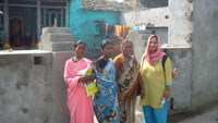 Researcher doing home visits with the lay health workers (ASHAs) in a primary care centre locality in Northern Karnataka